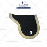 Horse saddle pad with quilted fabric and soft sheepskin lining by Khalique Sons International