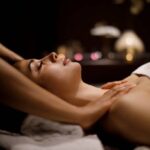 woman-enjoying-massage-in-spa-ce