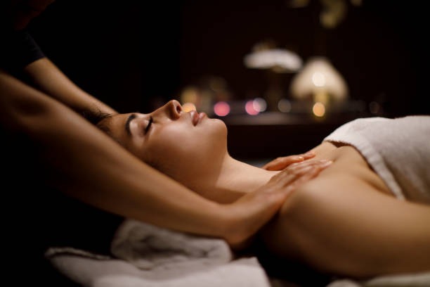 woman-enjoying-massage-in-spa-ce
