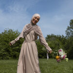 front-view-muslim-woman-posing-outdoors
