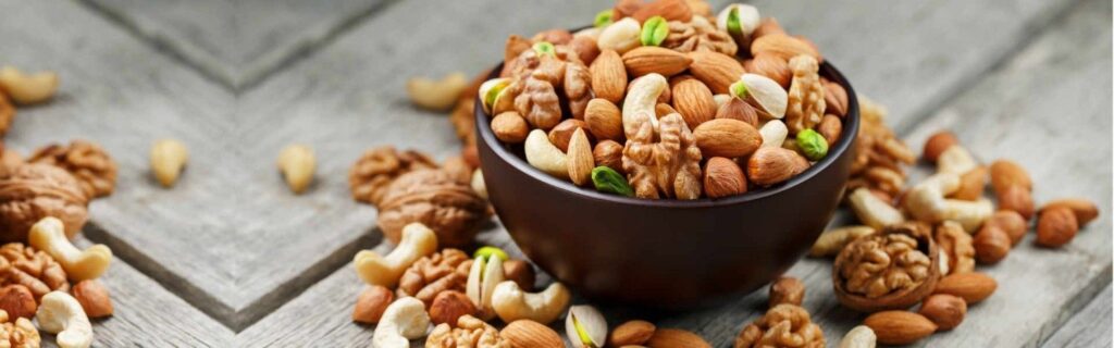 Bowl of flavoured nuts served as a healthy weight loss snack option