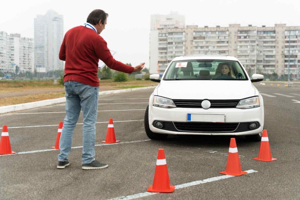 Student learning safe driving techniques during a driving course in Cambridge with a certified instructor from Yo Driving Academy.