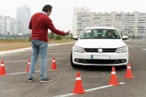 Student learning safe driving techniques during a driving course in Cambridge with a certified instructor from Yo Driving Academy.