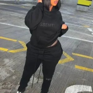 The Grey Essentials Hoodie: A Modern Icon of Minimalist Streetwear