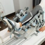 closeup-woman-physical-rehabilitation-with-arthromot-device_637285-9457
