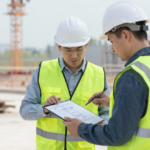 magnific__civil-engineer-and-architect-reviewing-digital-sit__86504