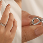 Close-up of two white gold infinity rings on a woman's hand, featuring intertwined and diamond infinity symbol designs.