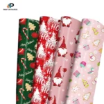 Custom Christmas wrapping paper rolls featuring festive holiday designs in red, green, and pink.