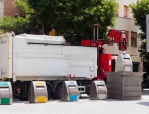 recycling-truck-picking-up-bin-city_11zon