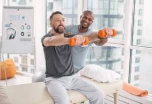 Joyful positive man enjoying the exercise